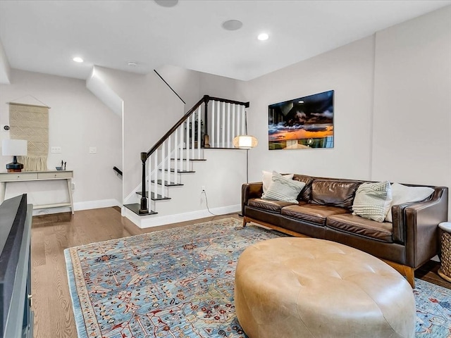 72-74 Grafton St Unit 2, Arlington, MA 02474 - living area with wood finished floors, stairs, recessed lighting, and baseboards