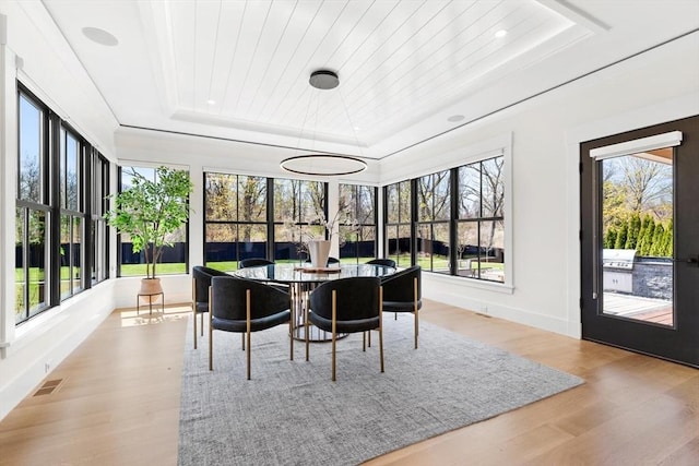 7 Fulton Rd, Lexington, MA 02420 - sunroom featuring visible vents, wood finished floors, a tray ceiling, and a healthy amount of sunlight