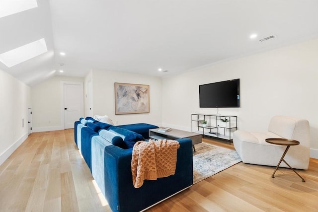 7 Fulton Rd, Lexington, MA 02420 - living area featuring recessed lighting, vaulted ceiling with skylight, light wood-type flooring, and visible vents