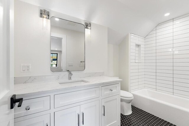 7 Fulton Rd, Lexington, MA 02420 - full bath featuring vanity, tile patterned flooring, toilet, recessed lighting, and vaulted ceiling