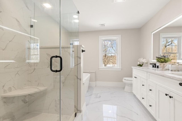 full bathroom featuring toilet, vanity, a healthy amount of sunlight, and independent shower and bath