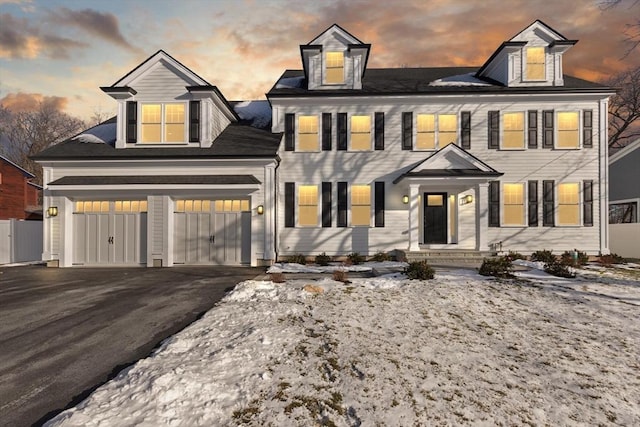 view of front of property with a garage