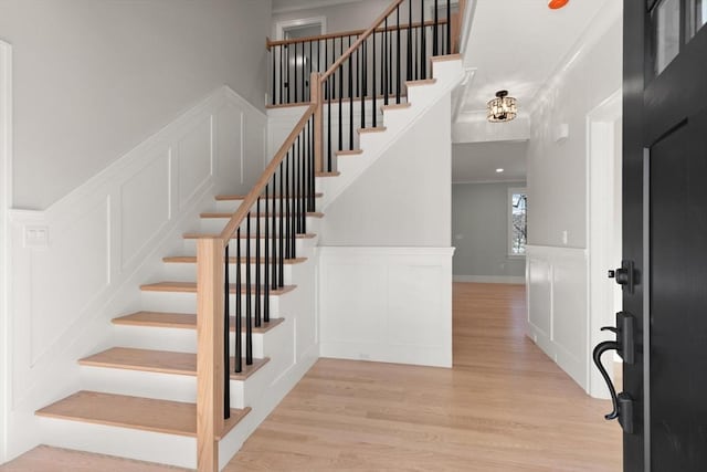 stairway featuring hardwood / wood-style floors