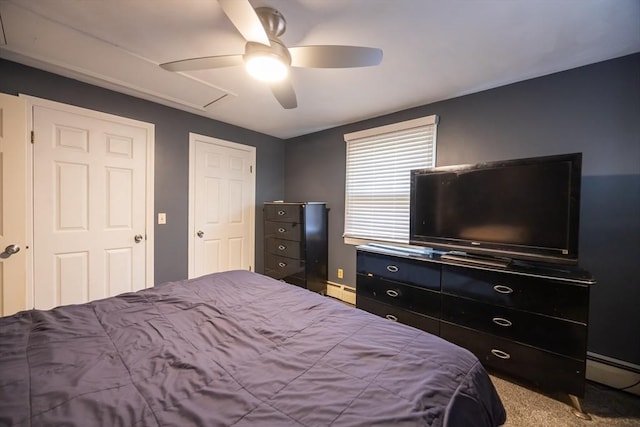 carpeted bedroom featuring a baseboard radiator, a baseboard heating unit, and ceiling fan