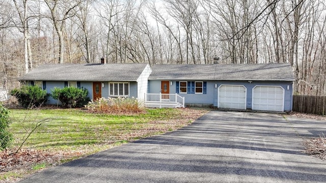 single story home with driveway, a garage, a shingled roof, a chimney, and fence