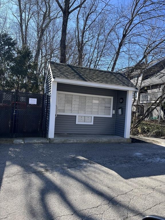 garage with fence