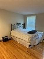 bedroom featuring hardwood / wood-style floors