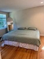 bedroom featuring hardwood / wood-style floors