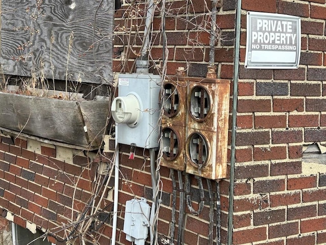 details with brick siding and electric meter