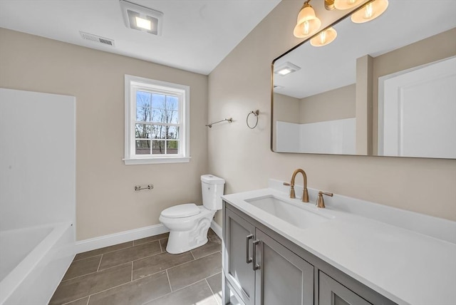 bathroom featuring toilet, baseboards, vanity, and a shower