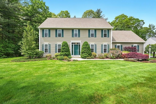 167 Orchard Rd, East Longmeadow, MA 01028 - colonial home featuring a front lawn
