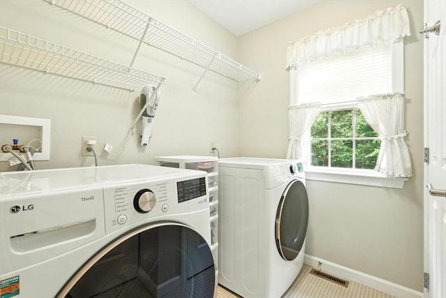 167 Orchard Rd, East Longmeadow, MA 01028 - laundry room featuring washer and dryer and baseboards