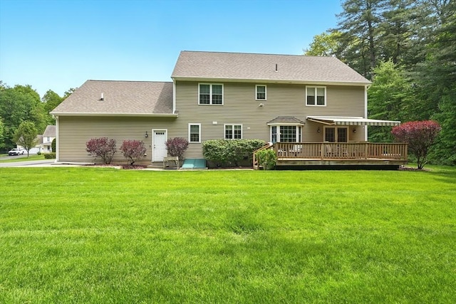 167 Orchard Rd, East Longmeadow, MA 01028 - rear view of property featuring a wooden deck and a lawn