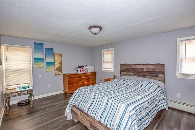 37 Border St, Springfield, MA 01104 - bedroom featuring dark wood-style floors and a baseboard radiator