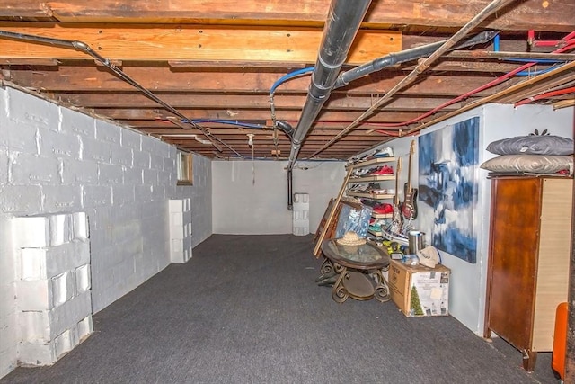 37 Border St, Springfield, MA 01104 - unfinished basement featuring concrete block wall