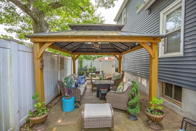 37 Border St, Springfield, MA 01104 - fenced backyard featuring a gazebo, a patio, and an outdoor living space
