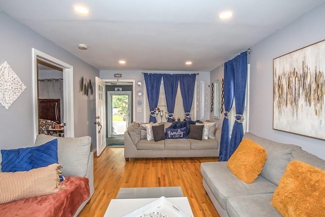 37 Border St, Springfield, MA 01104 - living area with light wood finished floors and recessed lighting