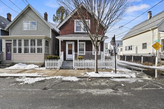 view of front of property featuring covered porch