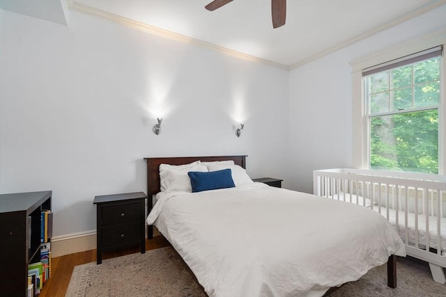 19 Woodbine St Unit B, Newton, MA 02466 - bedroom featuring crown molding, wood finished floors, a ceiling fan, and baseboards