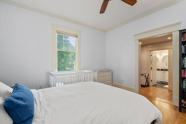 19 Woodbine St Unit B, Newton, MA 02466 - bedroom with crown molding, wood finished floors, and a ceiling fan