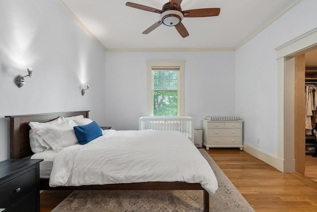 19 Woodbine St Unit B, Newton, MA 02466 - bedroom featuring crown molding, light wood-type flooring, ceiling fan, and baseboards