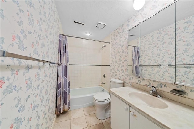 bathroom with visible vents, tile patterned flooring, vanity, toilet, and shower / tub combo with curtain
