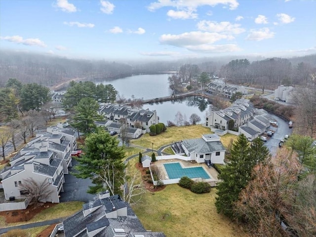 bird's eye view featuring a residential view and a water view
