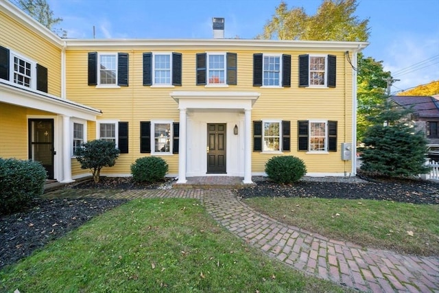 46 Church St, Dedham, MA 02026 - colonial house featuring a front lawn