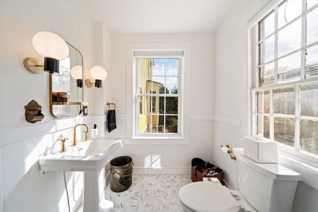 46 Church St, Dedham, MA 02026 - half bathroom with baseboards and toilet