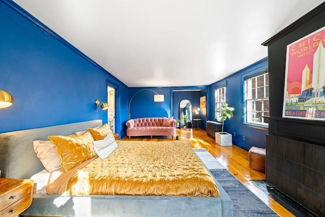 46 Church St, Dedham, MA 02026 - bedroom with wood finished floors and arched walkways