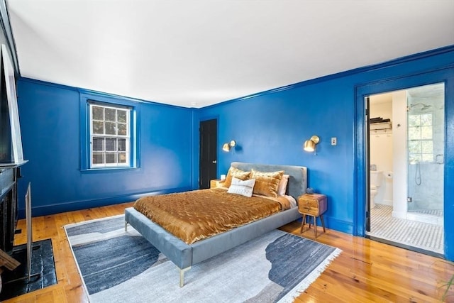 46 Church St, Dedham, MA 02026 - bedroom with baseboards and wood finished floors
