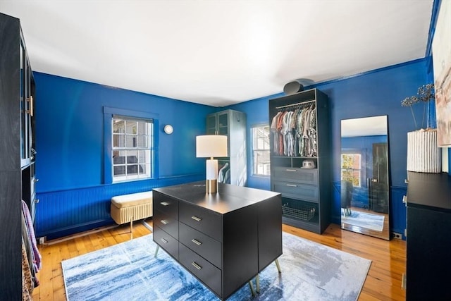 46 Church St, Dedham, MA 02026 - office with radiator heating unit, light wood-type flooring, and wainscoting