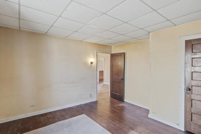 unfurnished room with hardwood / wood-style flooring