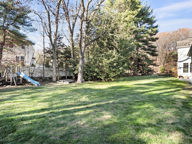 view of yard featuring a playground