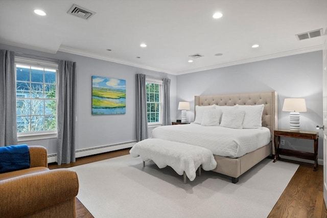 bedroom with a baseboard heating unit, crown molding, dark hardwood / wood-style flooring, and multiple windows