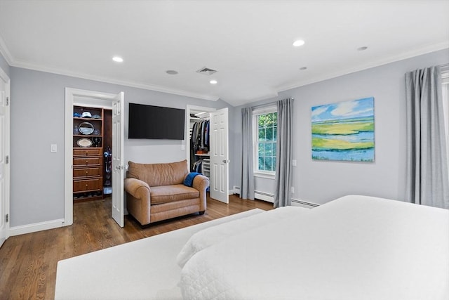 bedroom with crown molding, a baseboard radiator, a closet, and dark hardwood / wood-style flooring