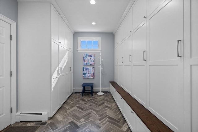 mudroom featuring a baseboard radiator and dark parquet floors