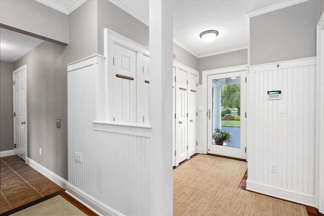 entrance foyer featuring crown molding