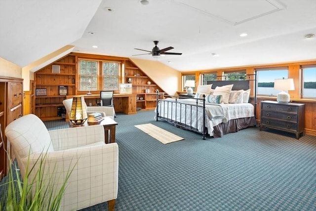 carpeted bedroom featuring multiple windows, lofted ceiling, and ceiling fan