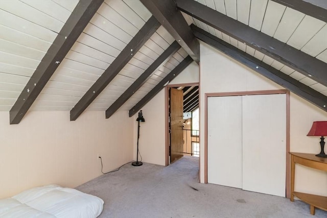 additional living space with wooden ceiling and carpet