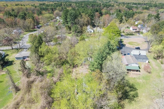 drone / aerial view with a view of trees