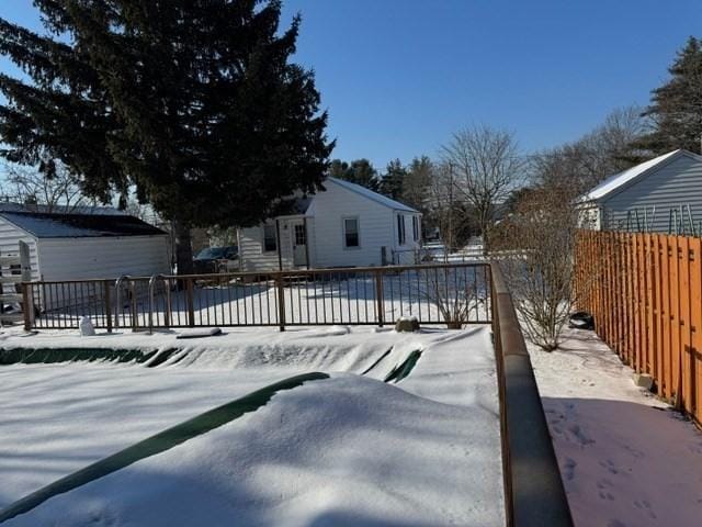 view of snow covered pool