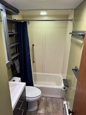 full bathroom with shower / bathtub combination with curtain, a baseboard radiator, vanity, and toilet