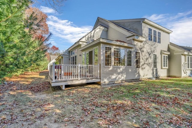 view of home's exterior with a deck