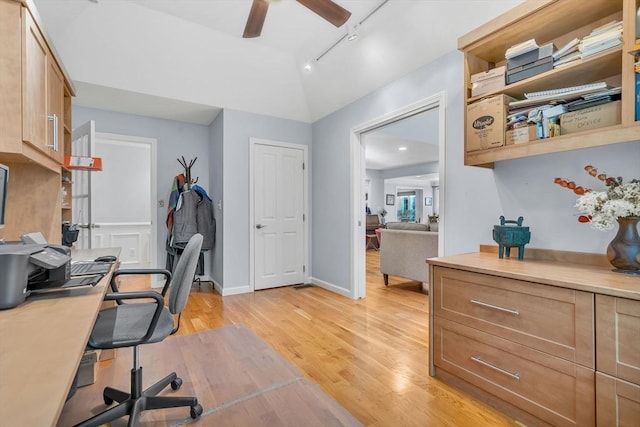 office space with lofted ceiling, track lighting, light wood-type flooring, and ceiling fan