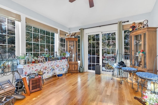 sunroom featuring ceiling fan