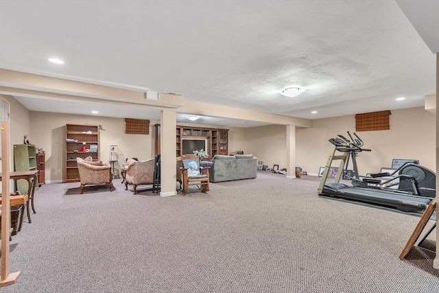 exercise room featuring carpet flooring