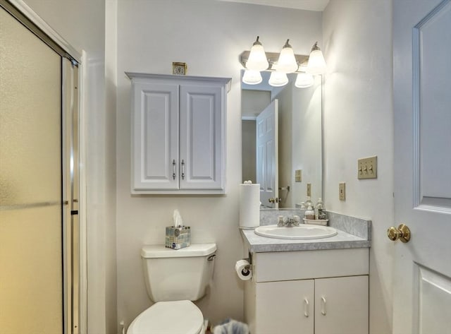 501 Lexington St Unit 105, Waltham, MA 02452 - full bathroom with vanity, a shower stall, and toilet
