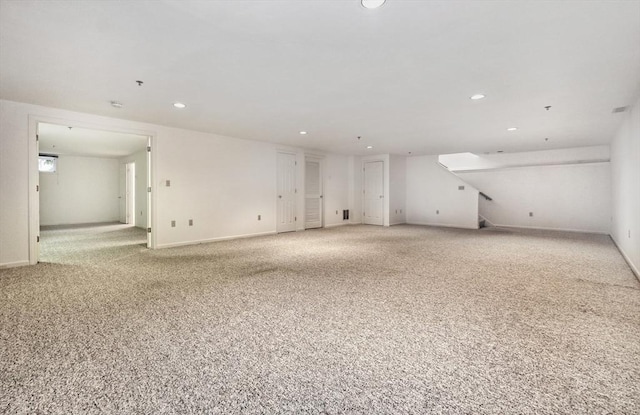 501 Lexington St Unit 105, Waltham, MA 02452 - carpeted spare room with recessed lighting, baseboards, and stairway