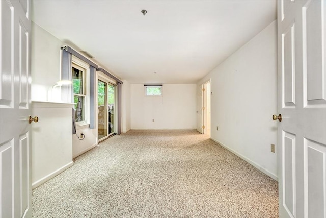 501 Lexington St Unit 105, Waltham, MA 02452 - unfurnished room featuring carpet, baseboards, and a pendent fire sprinkler